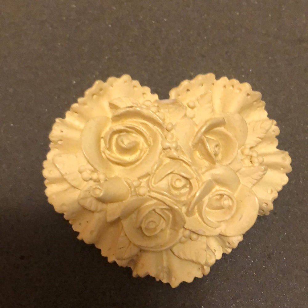 Vintage Hallmark ivory colored heart shaped pin.